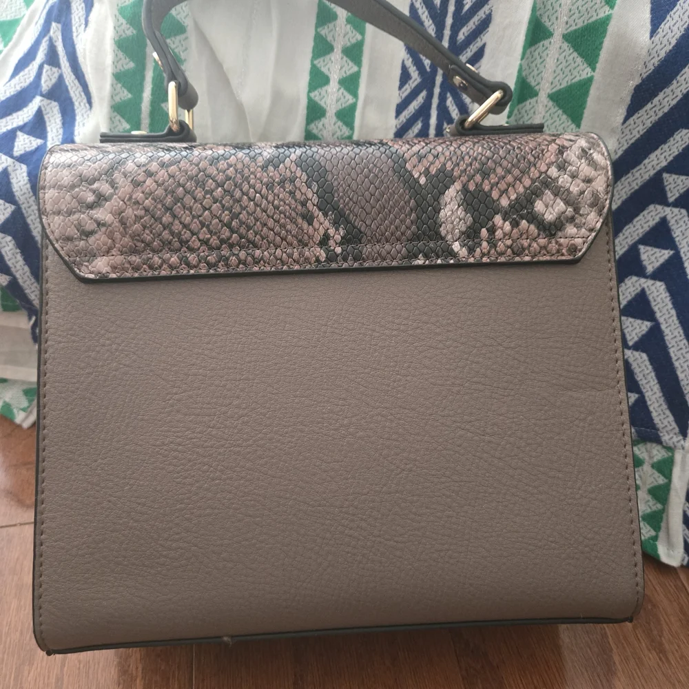 Dune London Taupe Satchel Crossbody with Snake-Print Flap and Gold Tassel